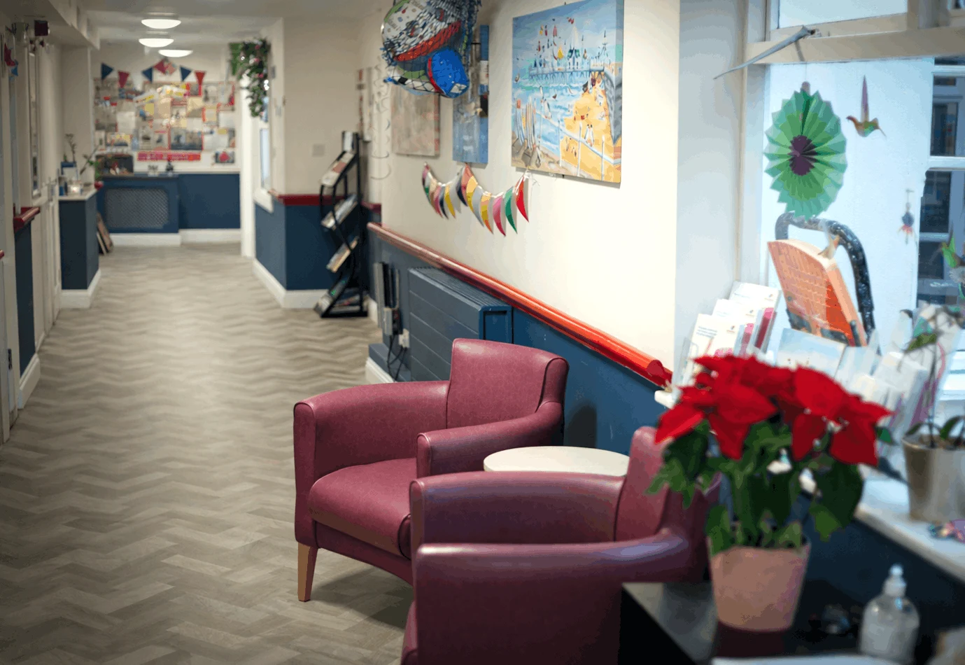 Residents enjoying the warm communal lounge at Parkside Nursing Home, Banstead